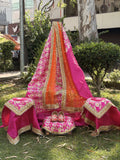 Vibrance of Divine Royalty 💖🧡✨ A stunning pink Guru Ji Chola Set paired with an elegant orange dupatta and intricate golden embroidery — crafted to add grace, devotion, and festive charm to every darbar by Rajesh Collections.