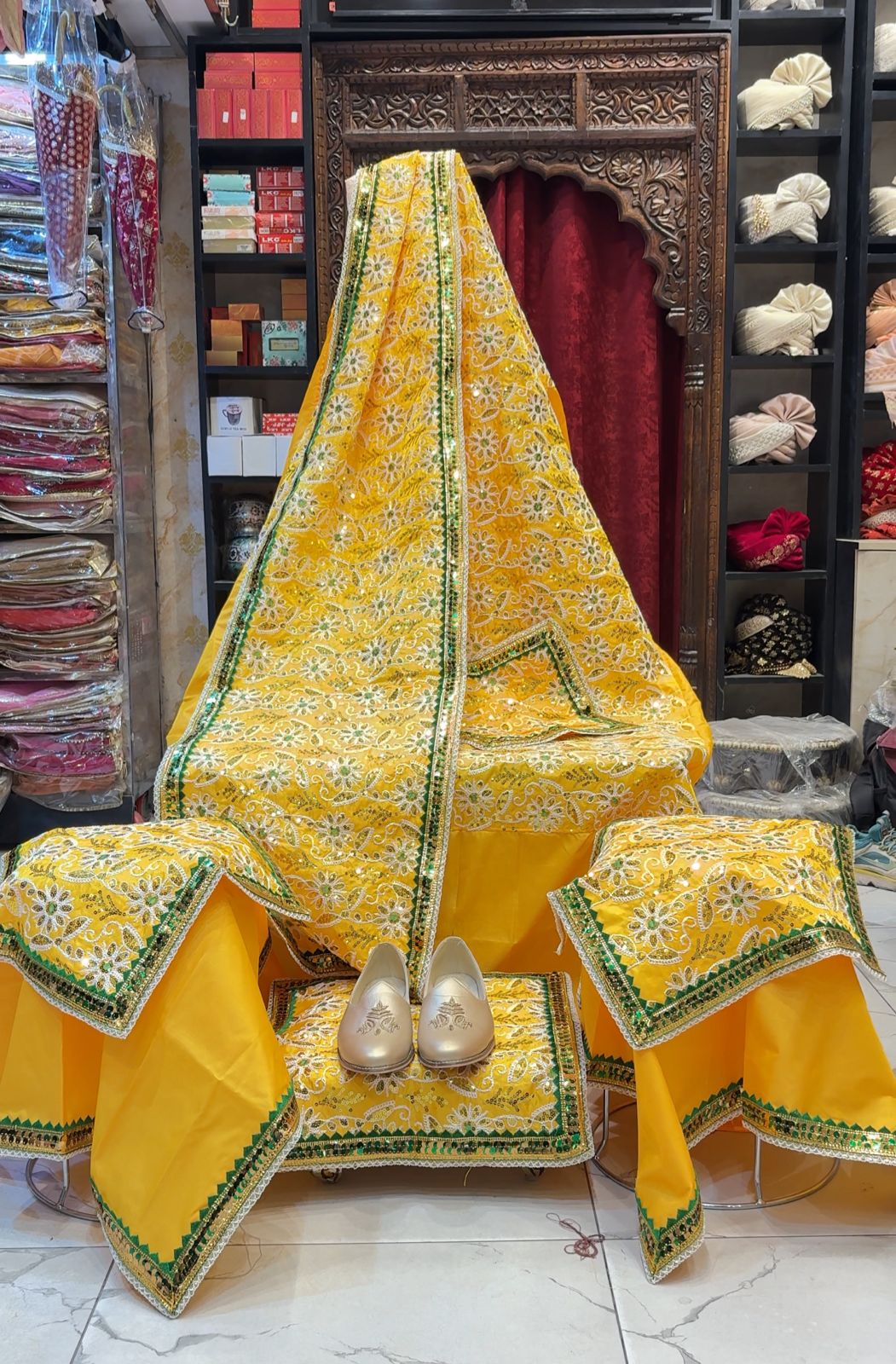 Radiance of Devotion 💛✨ A vibrant yellow Guru Ji Chola Set beautifully adorned with intricate floral embroidery and elegant green-golden detailing — crafted to brighten every darbar with divine grace by Rajesh Collections.