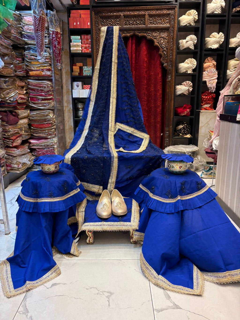 Royal Blue Guru Ji Chola Set ✨ Gracefully crafted with intricate detailing, rich velvet accents, and elegant golden lace work — a perfect blend of devotion and royalty by Rajesh Collections