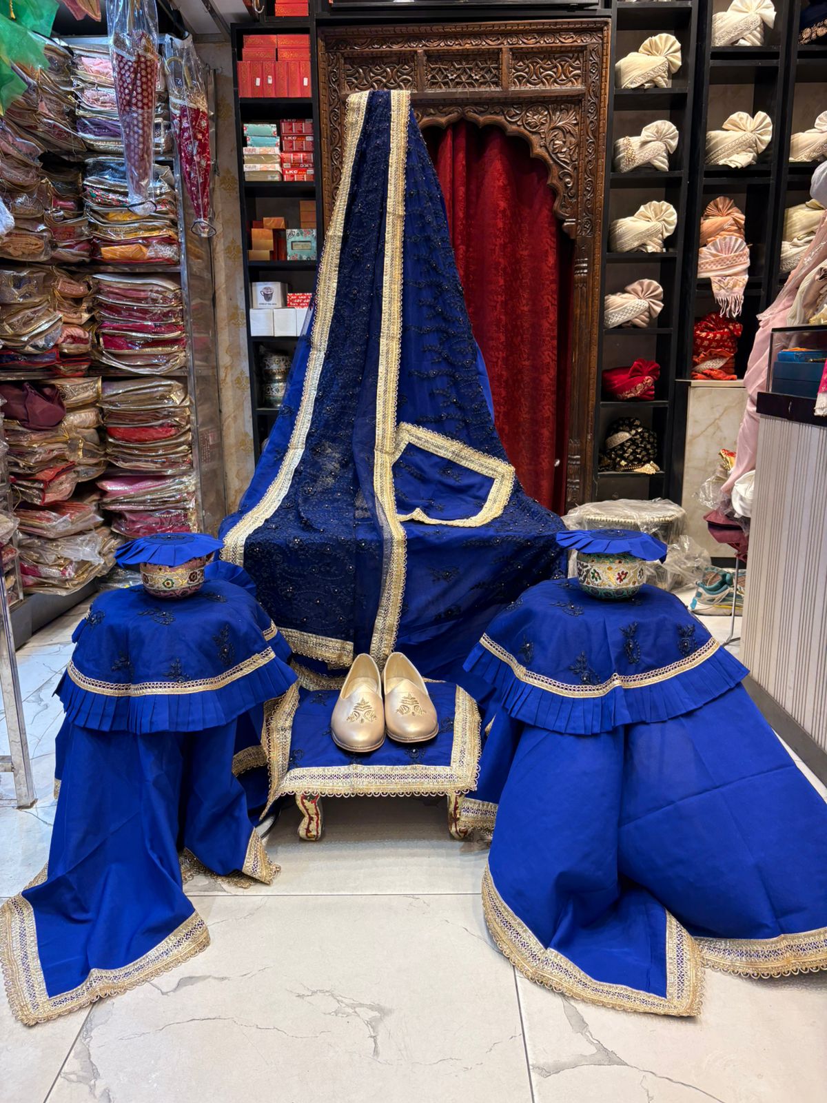 Royal Blue Guru Ji Chola Set ✨ Gracefully crafted with intricate detailing, rich velvet accents, and elegant golden lace work — a perfect blend of devotion and royalty by Rajesh Collections