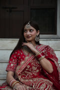 A bride’s dream in red Where tradition meets timeless royalty