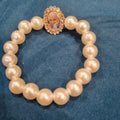Elegant Pearl Spiritual Bracelet with Divine Charm
