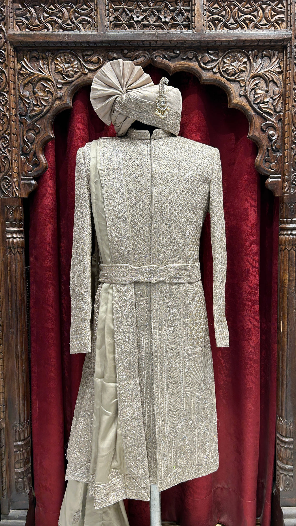 Royal elegance in Rust A timeless sherwani crafted with intricate embroidery, designed to make every groom stand out with grace and tradition.