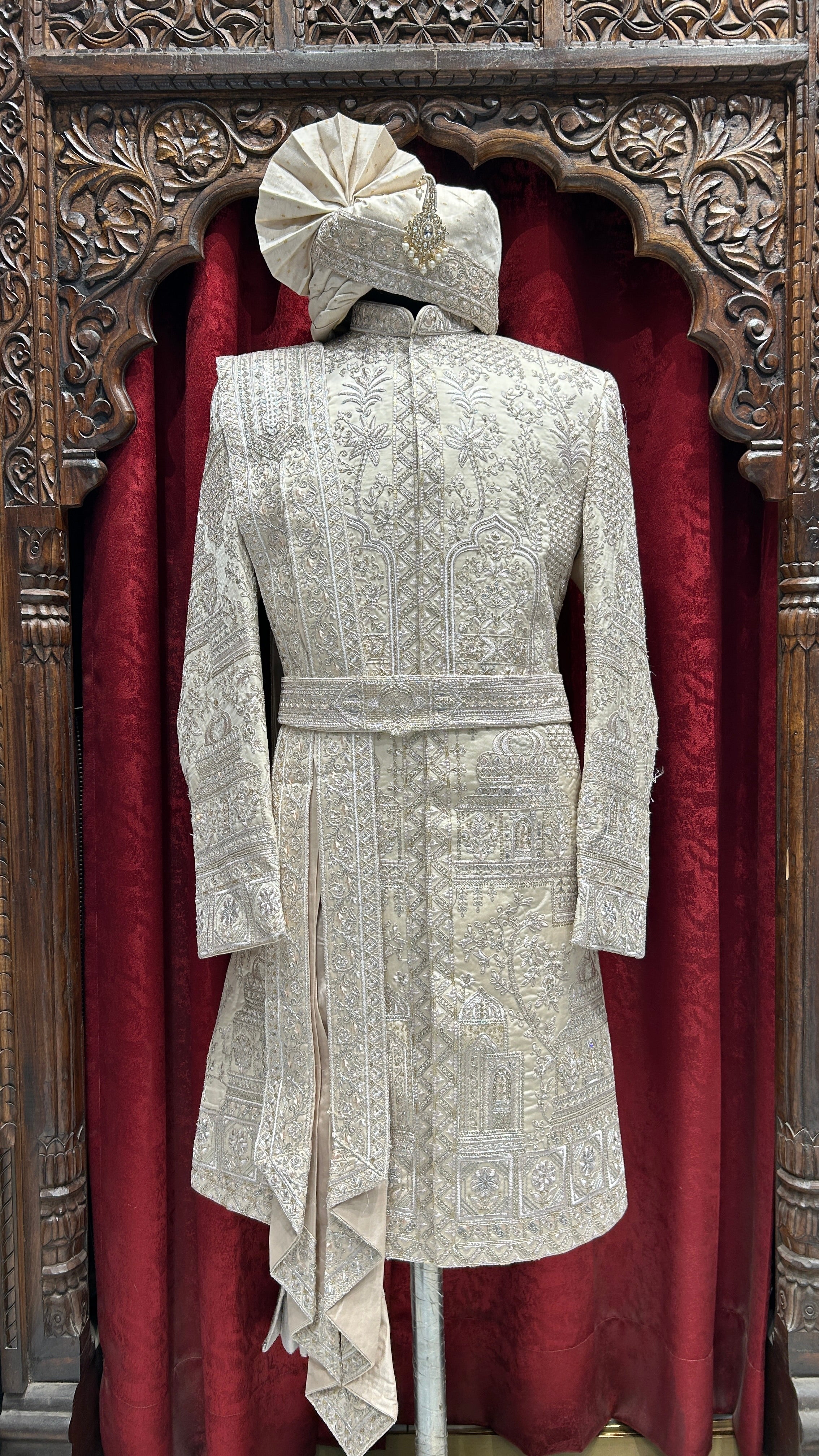 Royal charm in Beige A perfect blend of elegance and tradition for the modern groom.