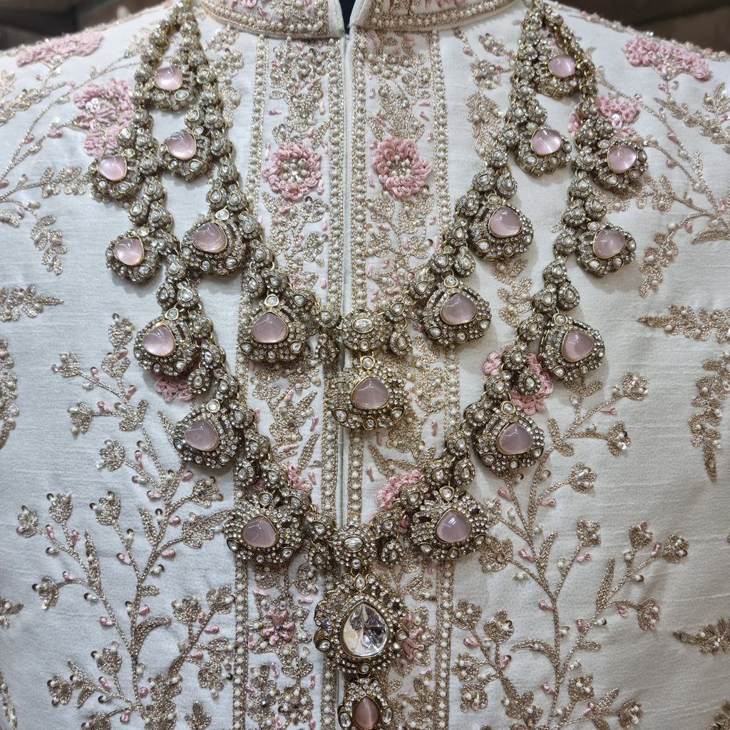 peach emerald groom jewellery with kalangi, crafted to complement traditional wedding attire.