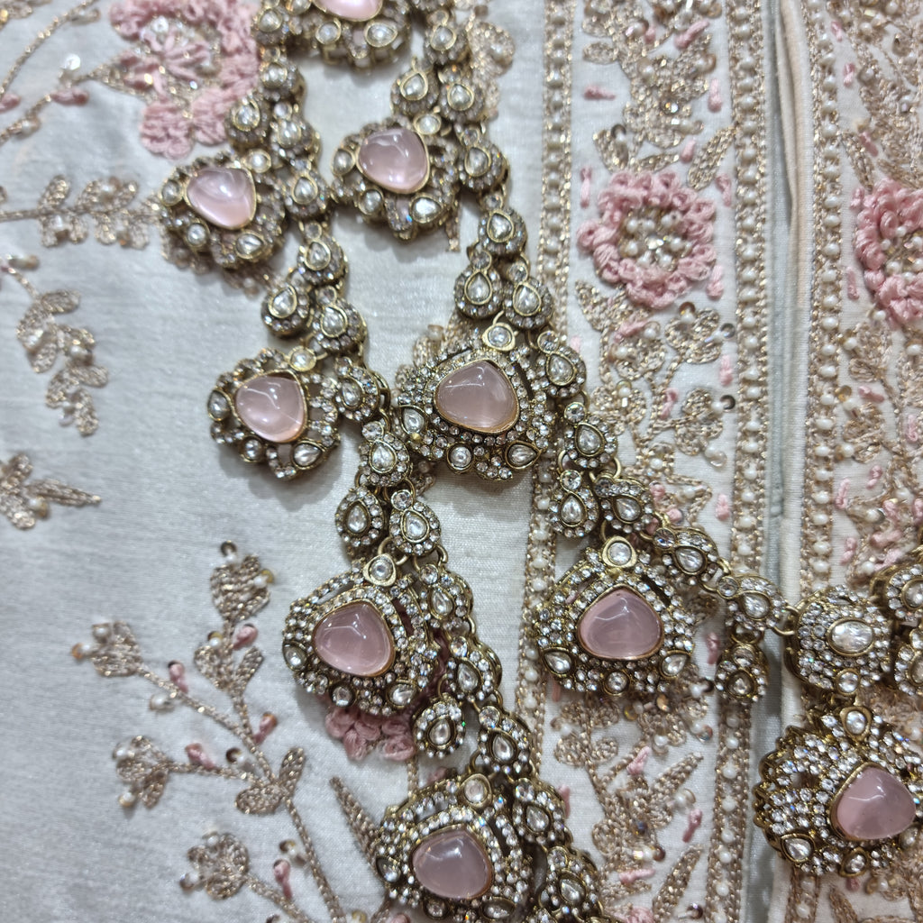 peach emerald groom jewellery with kalangi, crafted to complement traditional wedding attire.